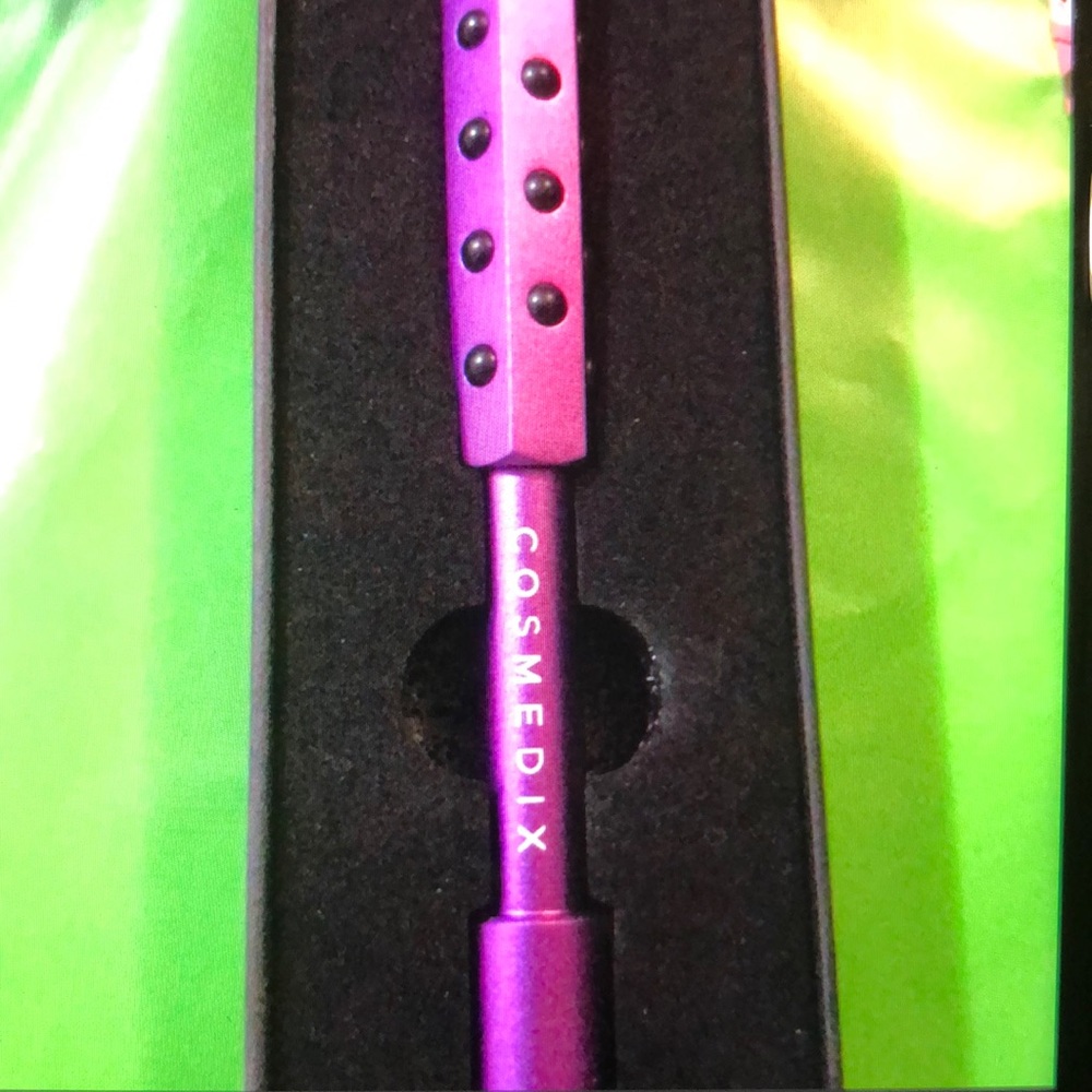 Cosmedix massage roller Purple NWT